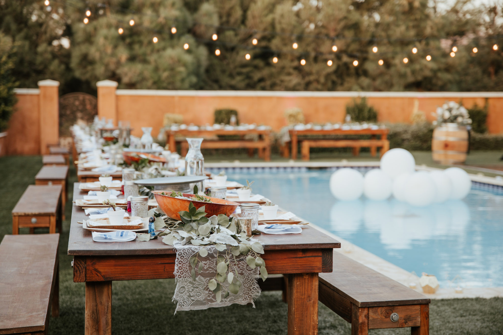 backyard wedding set up around pool