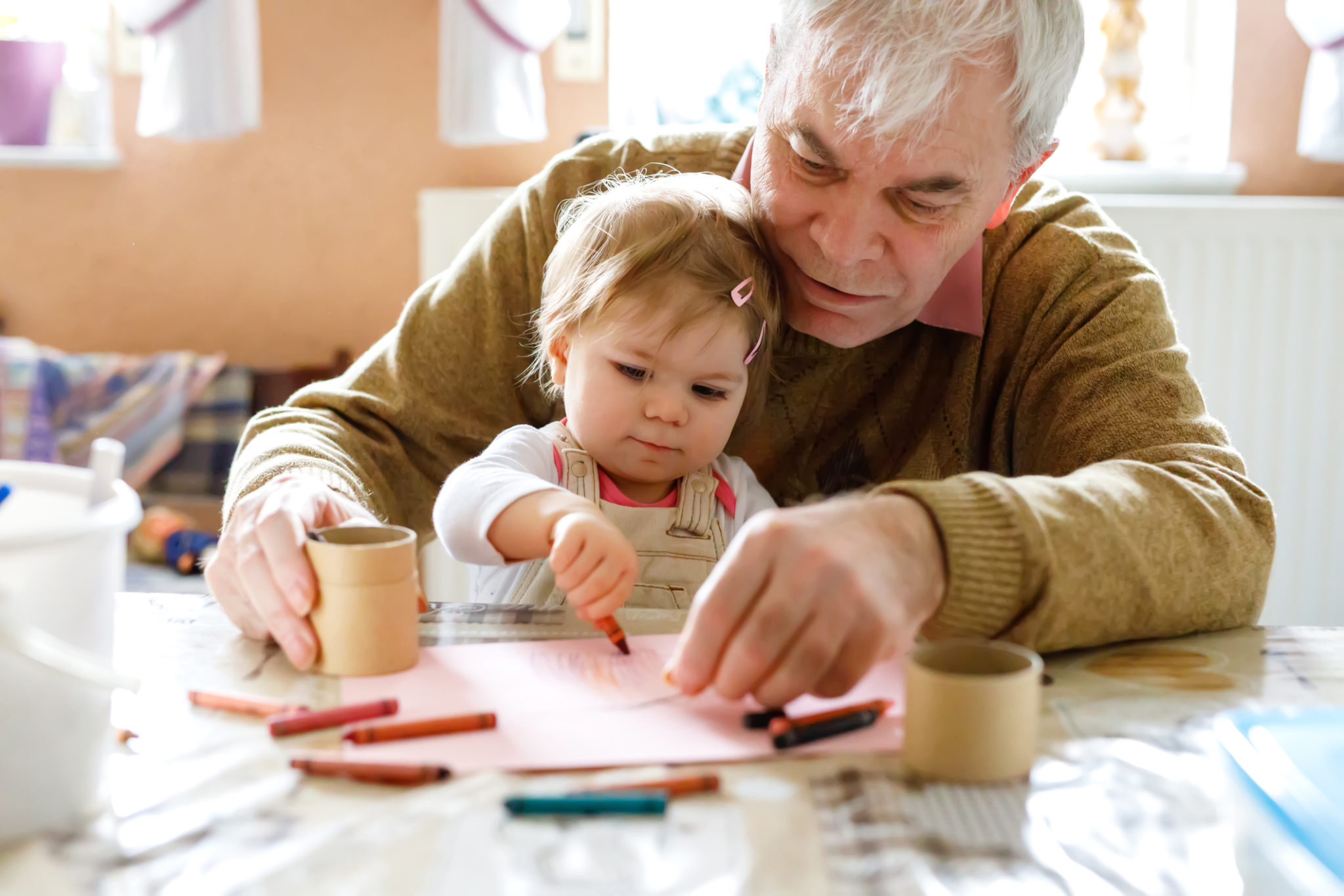 toddler and grandfather coloring