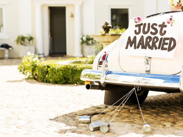 just married sign attached to car