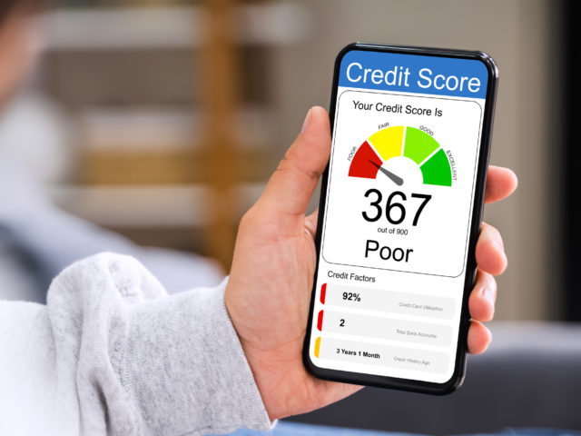 phone displaying poor credit score